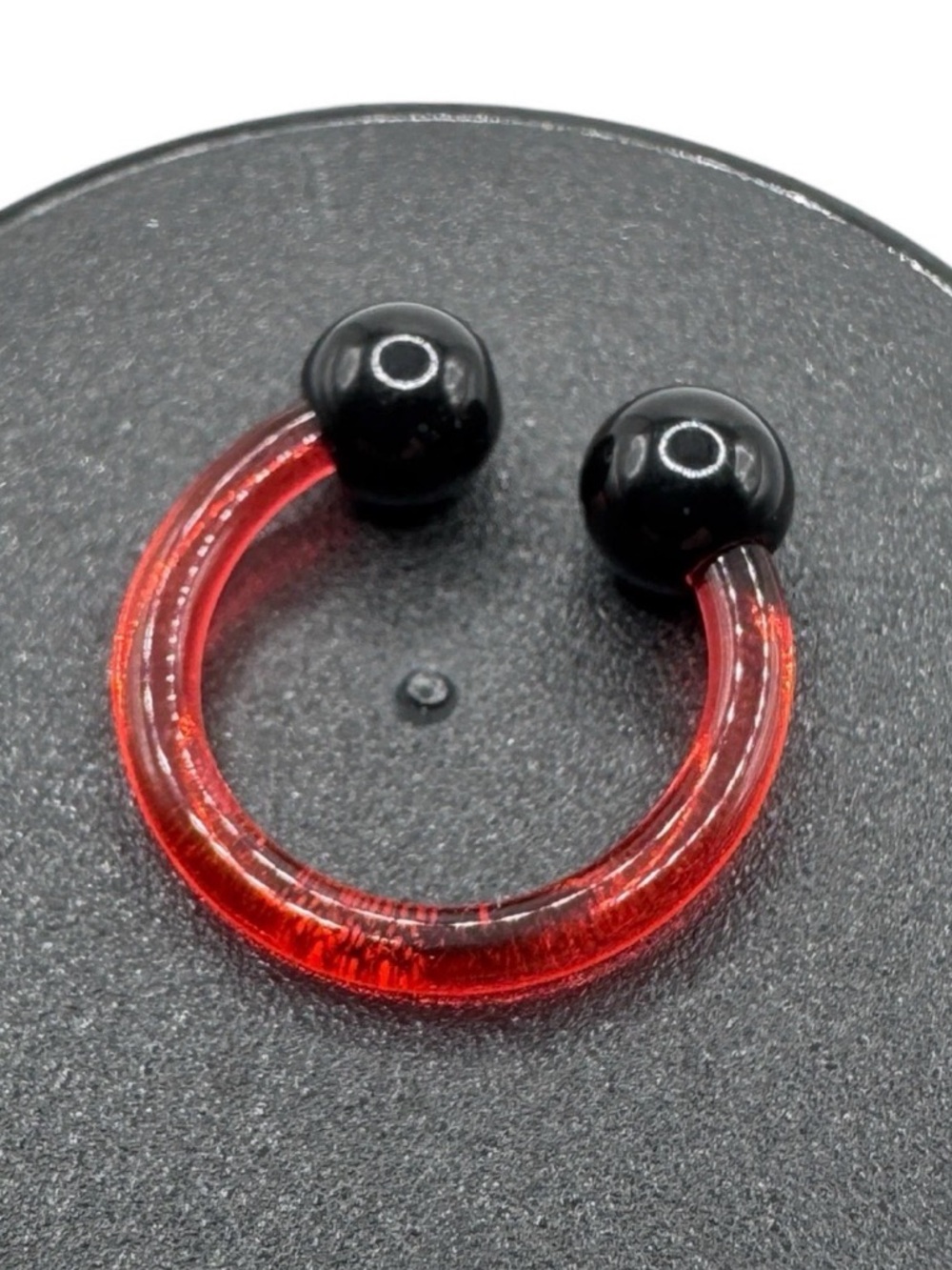 12g 1/2" Red Acrylic Circular Barbell Horseshoe Ring with Black Acrylic Balls